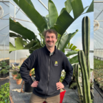 image of GPN's Forty under 40 winner Class of 2025 Clark Weber with green plants in the background.