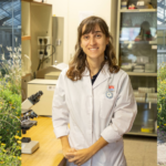 image of GPN's Forty under 40 winner Class of 2025: Leticia Tombion wearing a white lab coat.