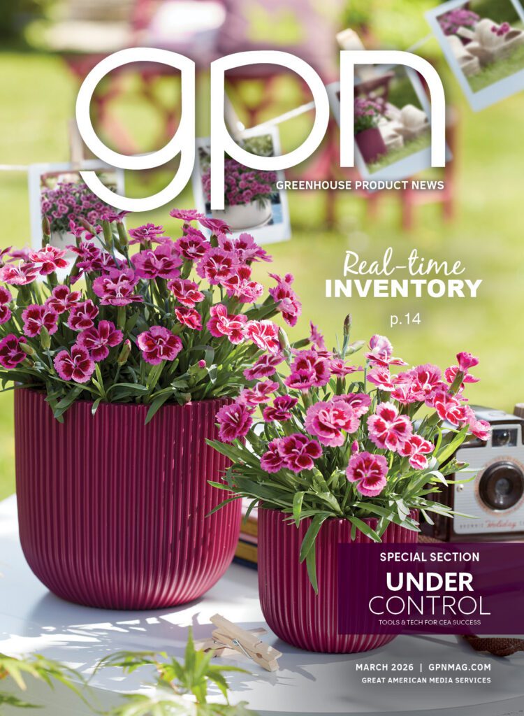 front cover of magazine with pink potted dianthus on a patio table