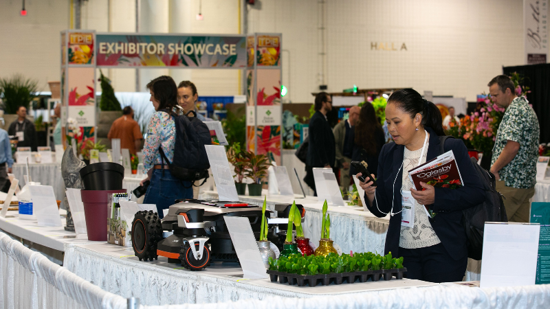 TPIE 2026 trade show floor wit people looking at a table set up