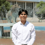 man in white shirt smiling