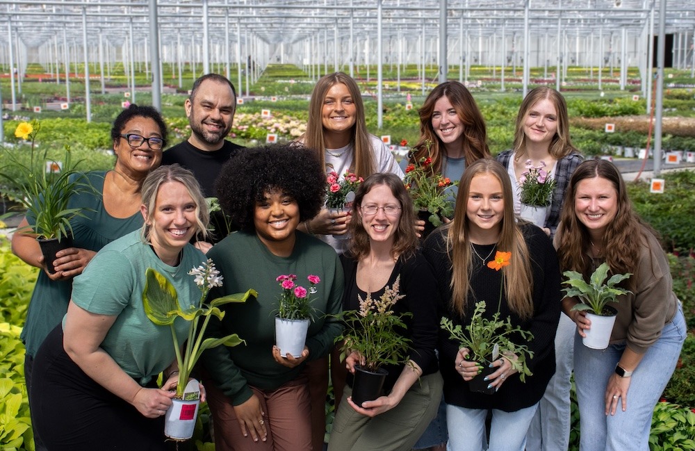 Great Garden Plants team photo in the greenhouse