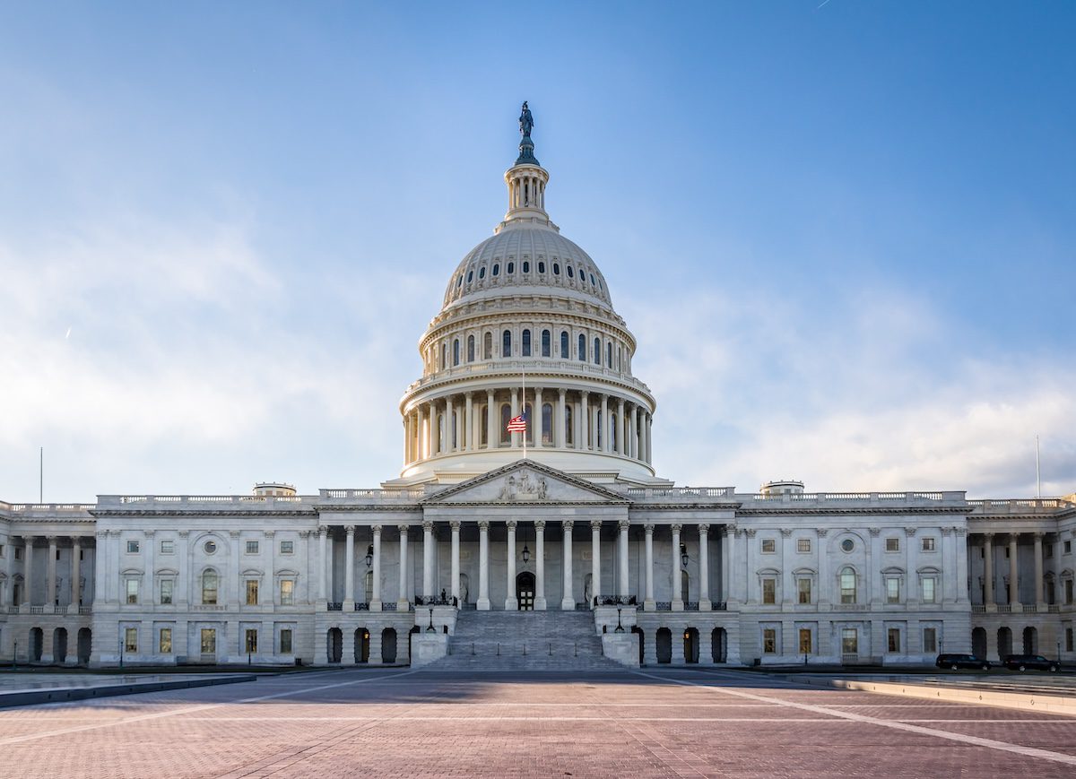 The U.S. Capitol building against a blue sky