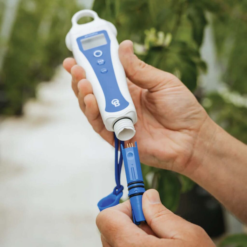 ph pen with hands removing the replaceable probe